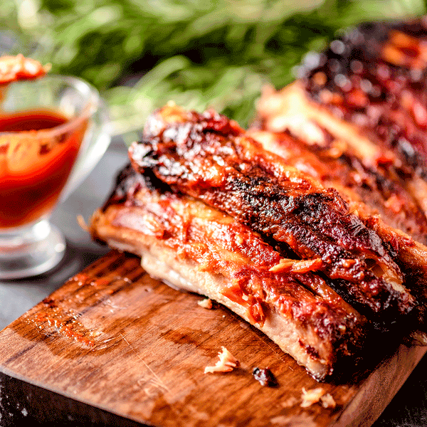 peach-sriracha Bbq baby back ribs. good for spicy adventures with food lovers. 